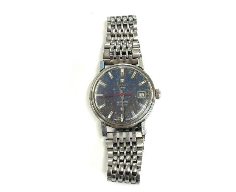 Gents Tissot automatic seastar watch is ticking but no warranty given 