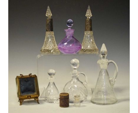 Pair of early 20th Century silver mounted scent bottles, 17cm high, together with a quantity of glass perfume bottles, decant