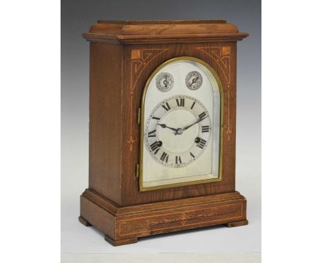 Hamburg American Clock Co - German inlaid oak cased mantel clock with silvered Roman chapter ring, beneath Chime/Silent and S