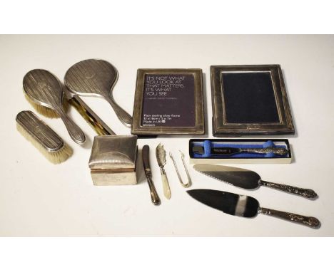 Quantity of silver backed dressing table pieces, mainly all Chester, together with two silver fronted photo frames, 16.5cm x 