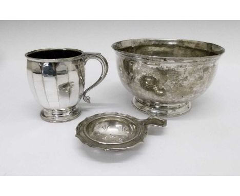 White metal unmarked pedestal bowl, together with a 20th Century silver tea strainer, 312g approx, and a EPNS Christening mug