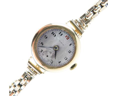 Elgin - Lady's 18K gold cased wristwatch, silvered Arabic dial with subsidiary seconds at 6 o'clock, 15 jewel manual wind mov
