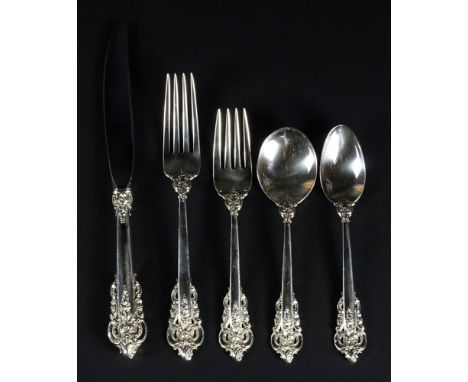 Seventy Two (72) Piece Wallace Grand Baroque Sterling Silver Flatware Set. Consisting of Twelve (12) Sterling Handled Knives 