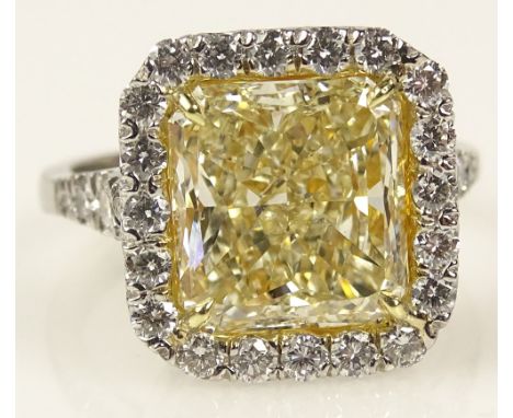 Important EGL Certified 5.0 Carat Radiant Cut Fancy Yellow Diamond, Platinum and 18 Karat Yellow Gold Engagement Ring accente