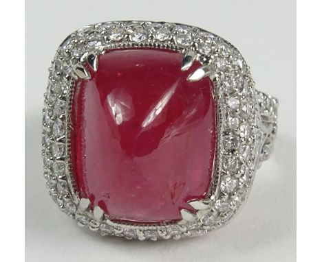 GIA Certified 15.41 Carat Natural Unheated Double Cabochon Sugarloaf Ruby, approx. 2.25 Carat Pave set Diamond and Platinum R