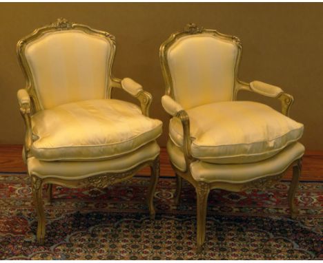 Pair Late 19th Century French Louis XV style Carved and Gilt Wood Fauteuils, Silk Upholstery. Unsigned. Minor Rubbing Consist