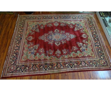 Semi-Antique Kirman Rug. Unsigned, No Tags. Small Area of Staining, Slightly Frayed Edges or in Good Condition. Measures 13 F