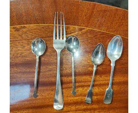 A hallmarked silver fork, various hallmarked spoons, 3.9oz