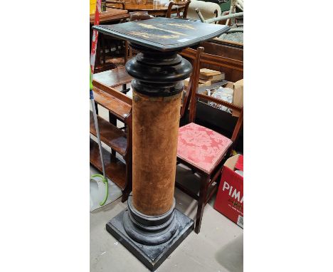 A ebonised wooden pillar stand with turned detailed, squared base, felt column. (some loss and warping to top) height 108cm 