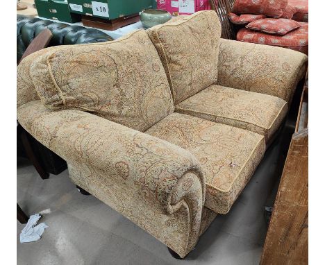 A Parker Knoll style two seater sofa in traditional pattern upholstery, Length 165cm 