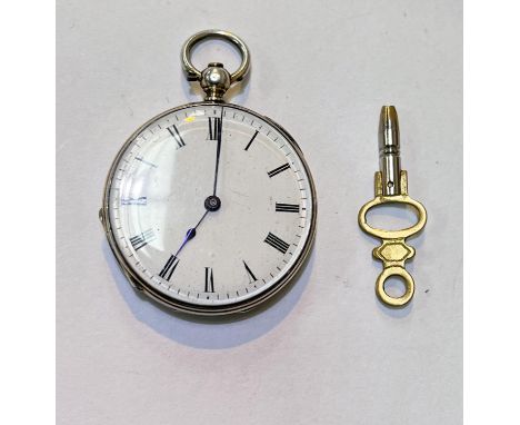 A Continental silver open faced pocket watch with engraved scene to back with a white enamel dial 