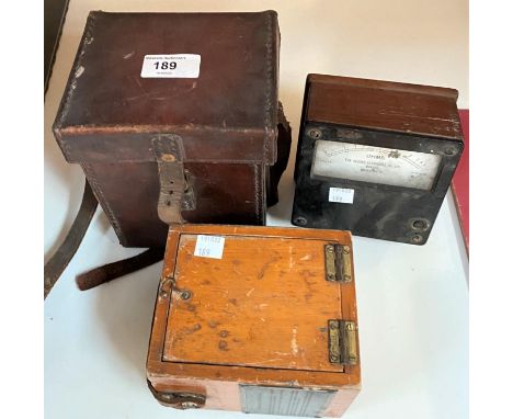 Three vintage scientific instruments, a leather cased bakelite record minor tester, an ohms tester and another item. 