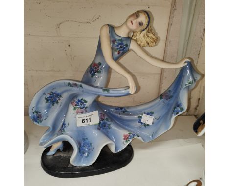 A Goldscheider figure of a female dancer holding her skirt by Stefan Dakon, circa 1935, impressed 7078 201 31, ht.25cm (very 