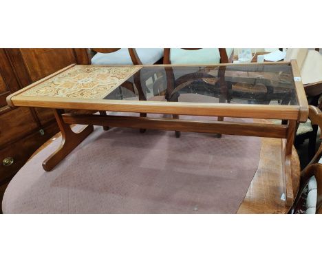 A 1960's teak coffee table with glass and tile top 