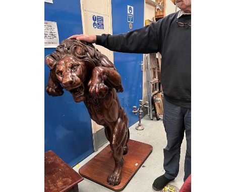 A large Architectural carved wooden Lion, rampant, standing on hind legs roaring, space for shield/sign under front paws, hei