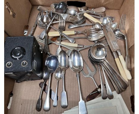 A Georgian hallmarked silver table spoon; three hallmarked silver tea spoons and a selection of silver plate cutlery etc. 