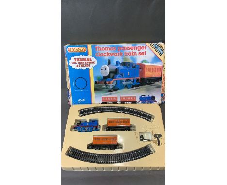 Hornby (Britt Allcroft), clockwork playtrain set, Thomas the Tank engine with Annie and clarabel, and track, box very poor