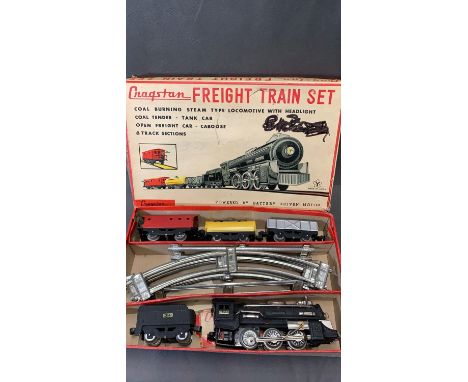 Cragstan corporation freight train set, clockwork (?) with lights engine and tender with 3 goods trucks (1 guards brake) and 