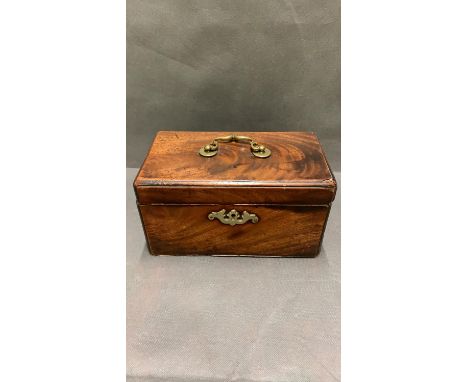 An antique tea caddy