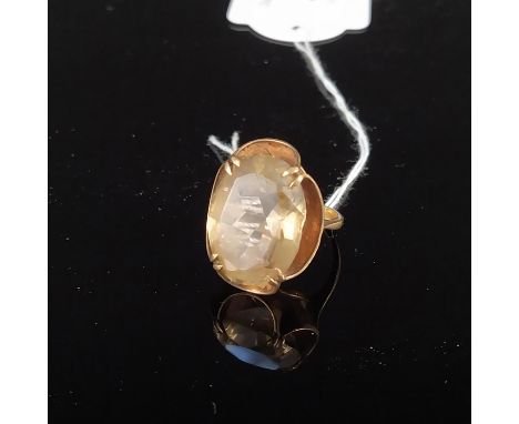 A 9ct gold ring set with a large quartz stone, size K, approx 6.5g