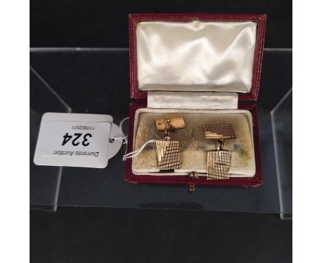 A pair of Art Deco 9ct gold rectangular cufflinks with engine turned decoration, engraved with initials and date, approx 5g