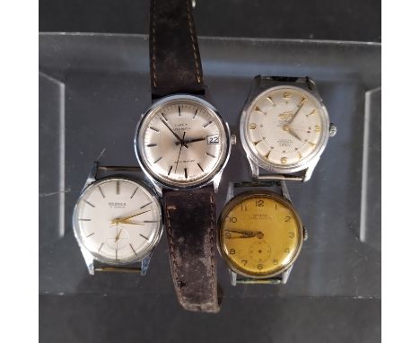 Four assorted vintage watch heads including Enicar, Bernex plus a Timex automatic (as found)