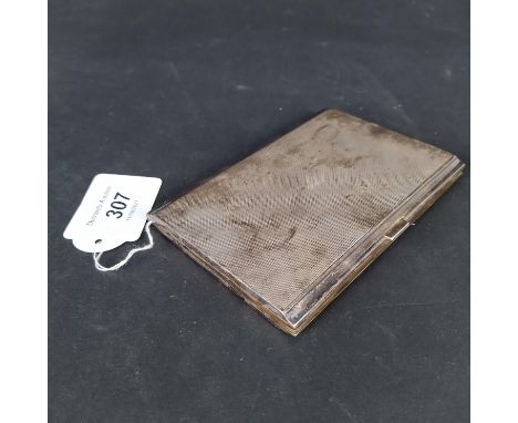 A silver cigarette case with engine turned decoration and inscription to inside, hallmarked Birmingham 1956, approx 170g