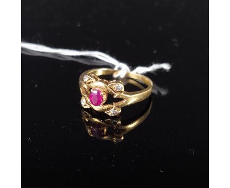 An 18ct gold red stone and diamond set ring, size K, approx 2.8g