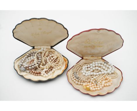 A quantity of vintage faux pearls together with two clam-shell pearl presentation cases