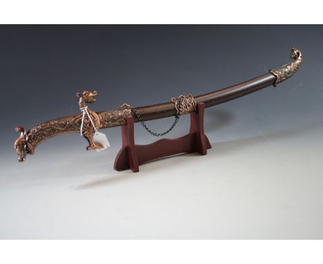 A Chinese decorative sword and stand, 65 cm