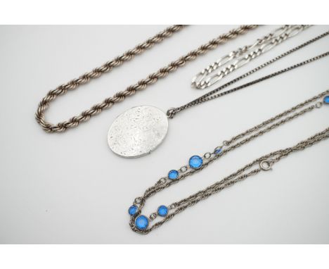 Vintage white metal necklaces, including a slender locket with engraved scrolling foliage on a box-link neck chain, and a rop