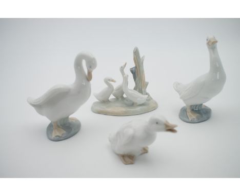 Four Nao figurines, three geese and one duck