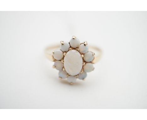 A 9ct gold and opal flower head cluster dress ring, N, 2g