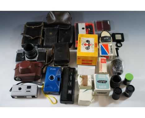 Cameras including a Practika MTL3, Kodak Instamatic 204, Kodak Instamatic 91, AGFA Iso Rapid I, Halina 35x, and Ensign Pocket