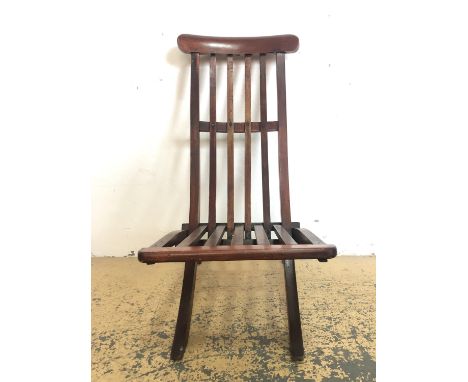 A vintage oak folding chair
