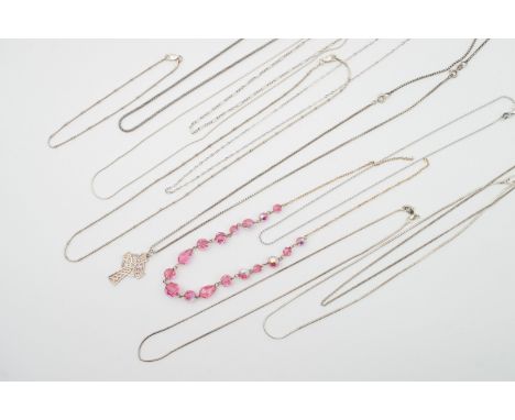 A Celtic cruciform pendant on chain and other white-metal necklaces (test as silver), 53.8g total