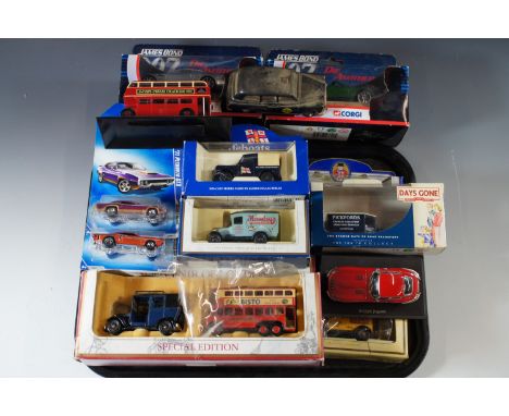 Boxed model cars and vans, including Corgi 007 Aston Martin Vanquish and 007 Jaguar XKR