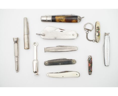 A quantity of vintage clasp knives and a "C.W.S Goods Are Best" advertising pocket lighter etc