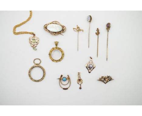 Victorian and Edwardian gilt metal and paste jewellery, including brooches, Art Nouveau pendants and stick pins 