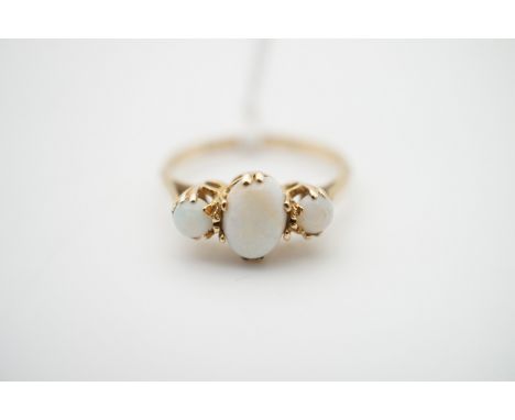 A 9ct gold and three stone opal dress ring, I, 1.5g