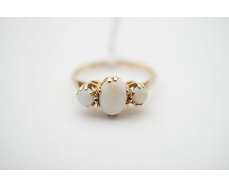 A 9ct gold and three stone opal dress ring, I, 1.5g