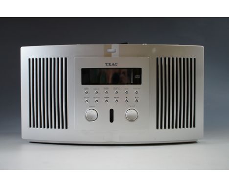 A TEAC SR-L35 radio / CD / alarm with handbook and remote control 
