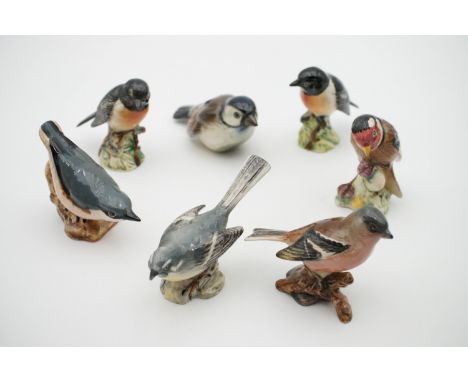 Beswick and Hummel bird figurines, including a grey wagtail