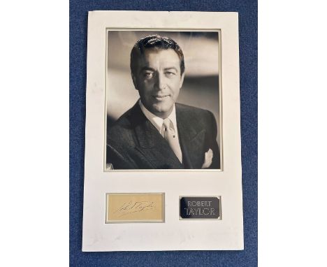 Actor, Robert Taylor beautifully presented matted Signature Piece, Overall Size 23x14. This lovely item includes a black and 