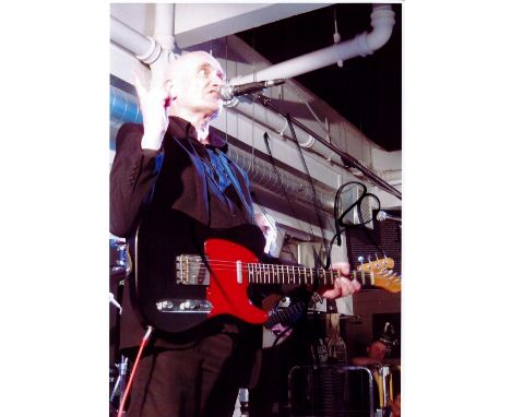 English Guitarist Wilko Johnson Personally Signed 12x8 Colour Photo. Signed in black marker pen at the Classic Rock Awards in