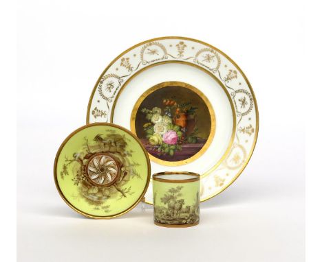 A Paris porcelain plate and a can and saucer  19th century, the plate painted to the well with a two-handled vase surrounded 