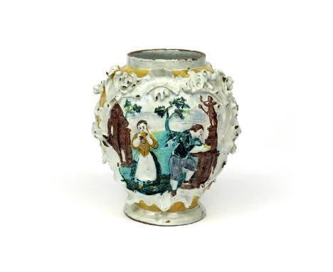 A large Continental faïence vase  late 18th century, probably German, the ovoid form moulded to one side with a stag beside a