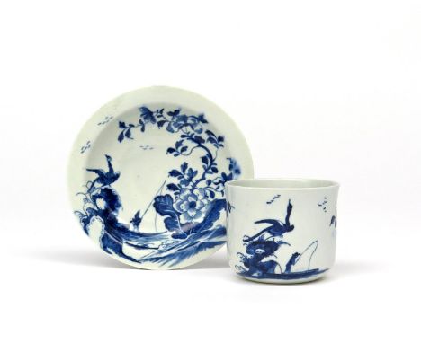A Worcester blue and white fingerbowl and stand   c.1758, painted with the Cormorant pattern, the eponymous bird perched atop