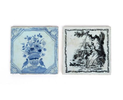 A signed Liverpool delftware tile  c.1757-61, printed in black by John Sadler with lovers seated beneath a tree, the lady dra