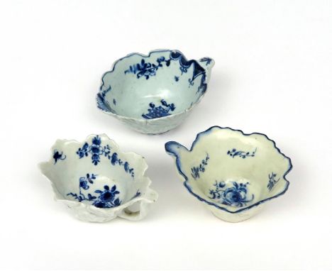 Three English porcelain blue and white butterboats  c.1760-70, one Lowestoft, of rare form with overlapping leaves to the ext